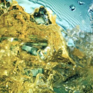 Ice Cubes Swirl In Ginger Beer